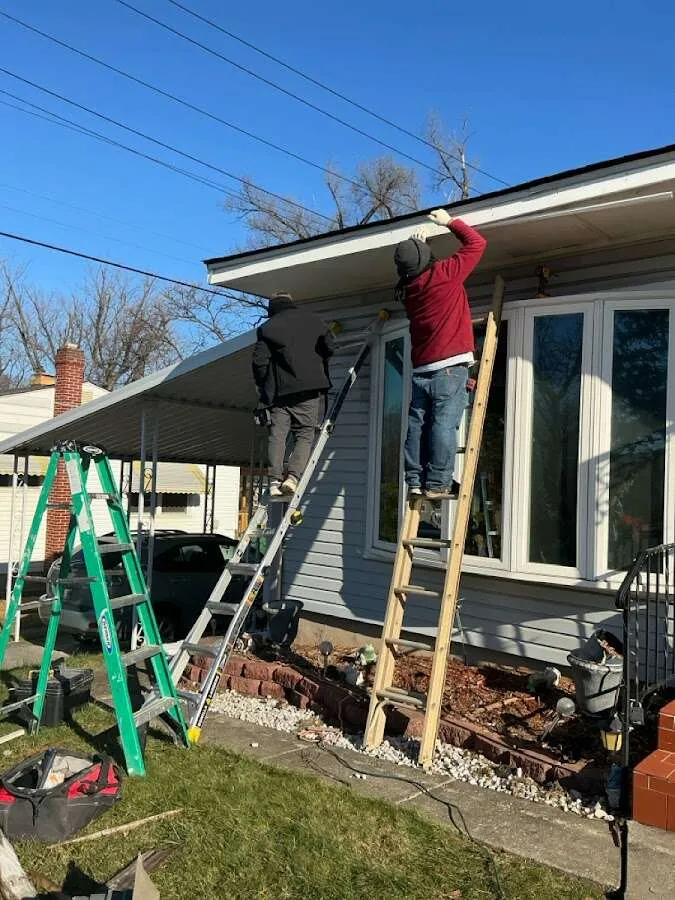 Restoration crew performing exterior repair in Cortland